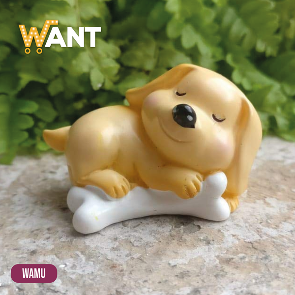 PERRO DORMIDO SOBRE SU HUESO